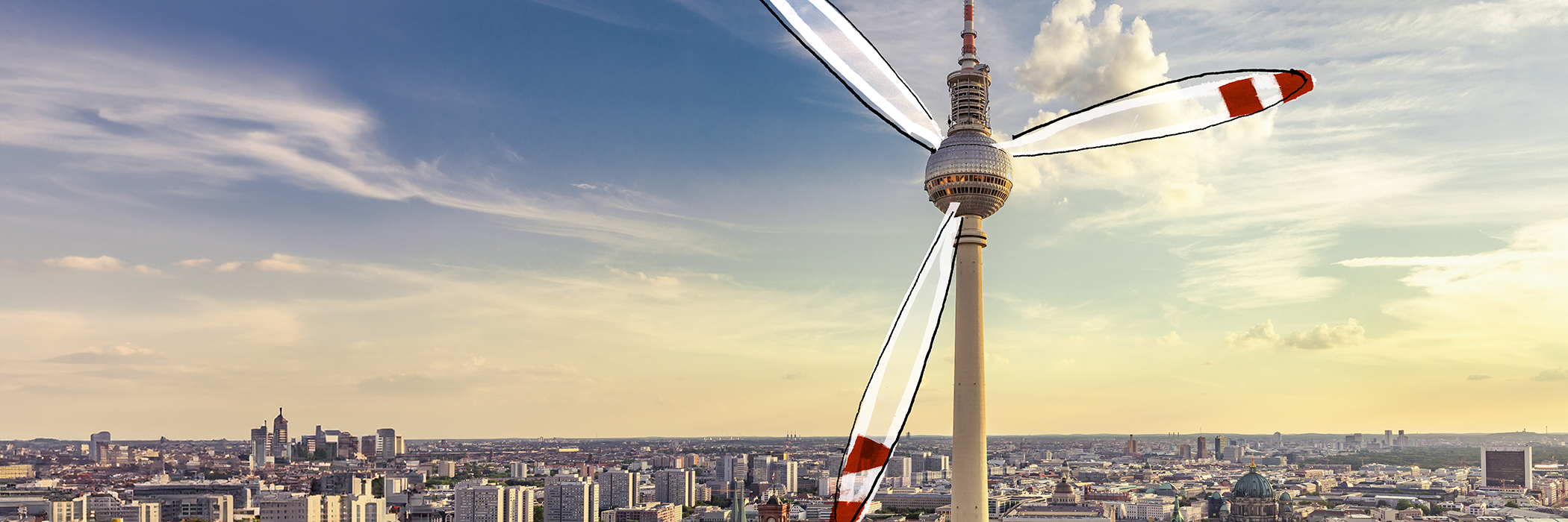 Berliner Fernsehturm mit Windradflügeln