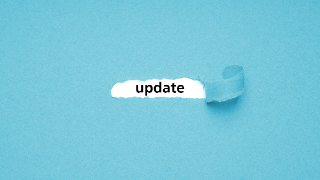 update, coming soon - blue torn paper revealing text