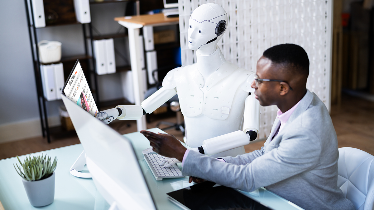 SQC, Projekte: GenKI4Media AI Humanoid Advisor Robot Looking At KPI Data Dashboard