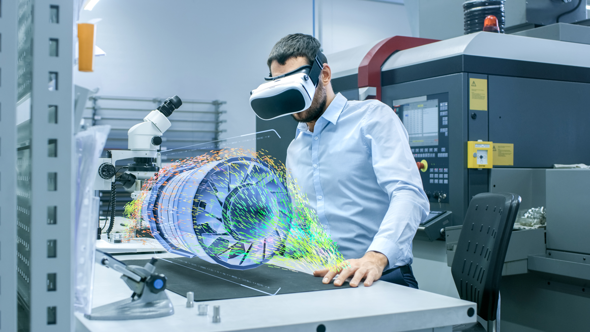 FOKUS; NGNI, News: Open5GCore 2019 Factory Chief Engineer Wearing VR Headset Designs Engine Turbine on the Holographic Projection Table. Futuristic Design of Virtual Mixed Reality Application.