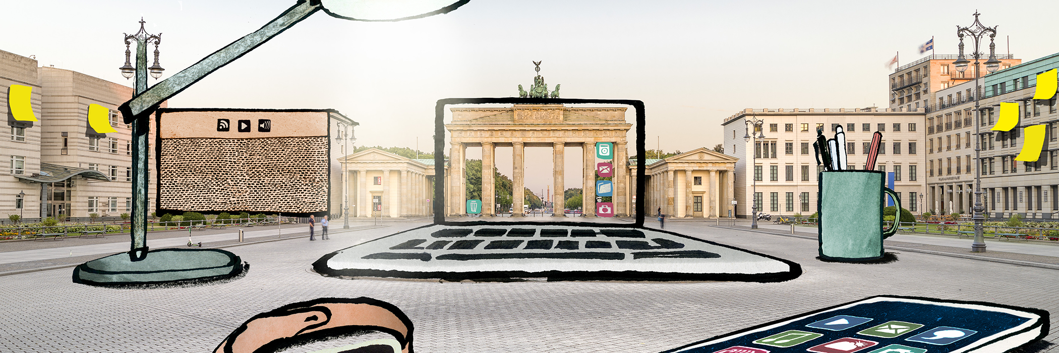 Schreibtischutensilien auf dem Pariserplatz mit Brandenburger Tor in Berlin